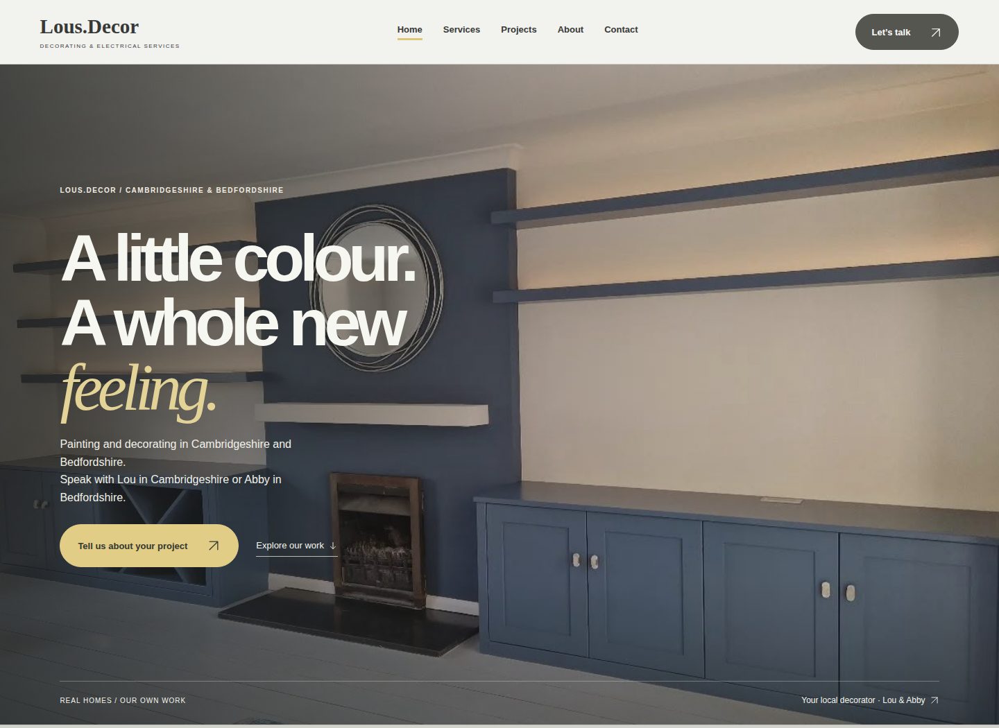 Lou's Decor homepage with large typography over a photograph of blue-grey decorated cabinetry
